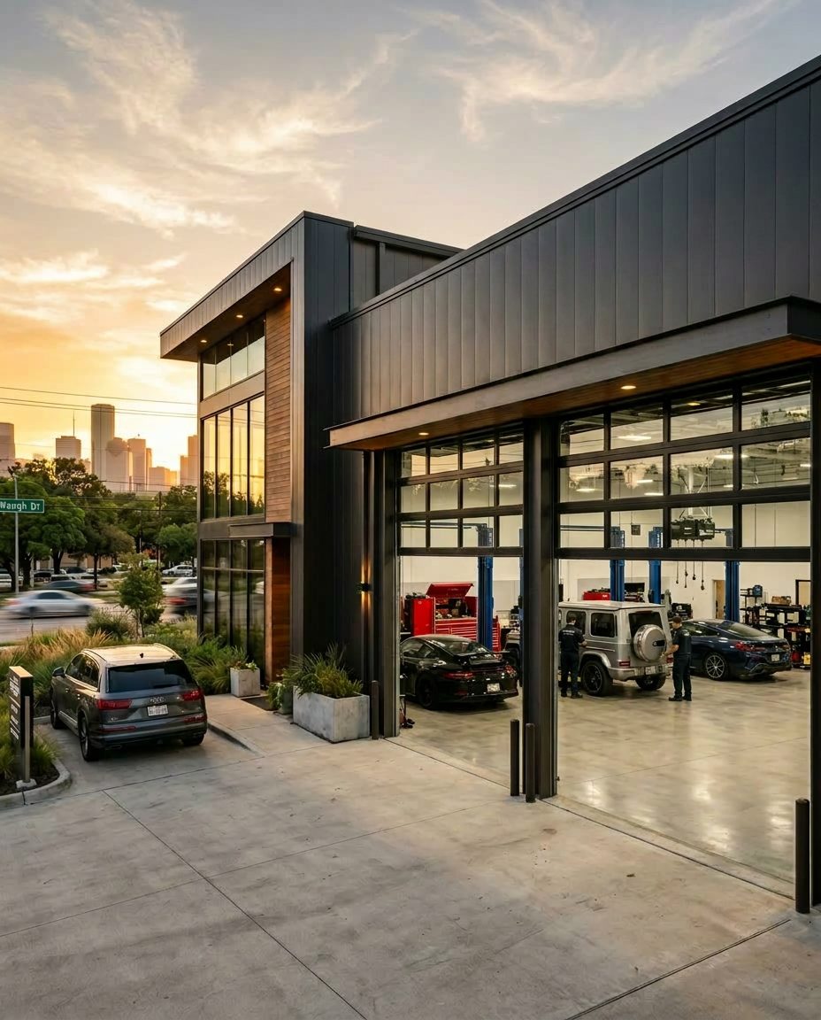 Modern Houston collision repair facility exterior at golden hour