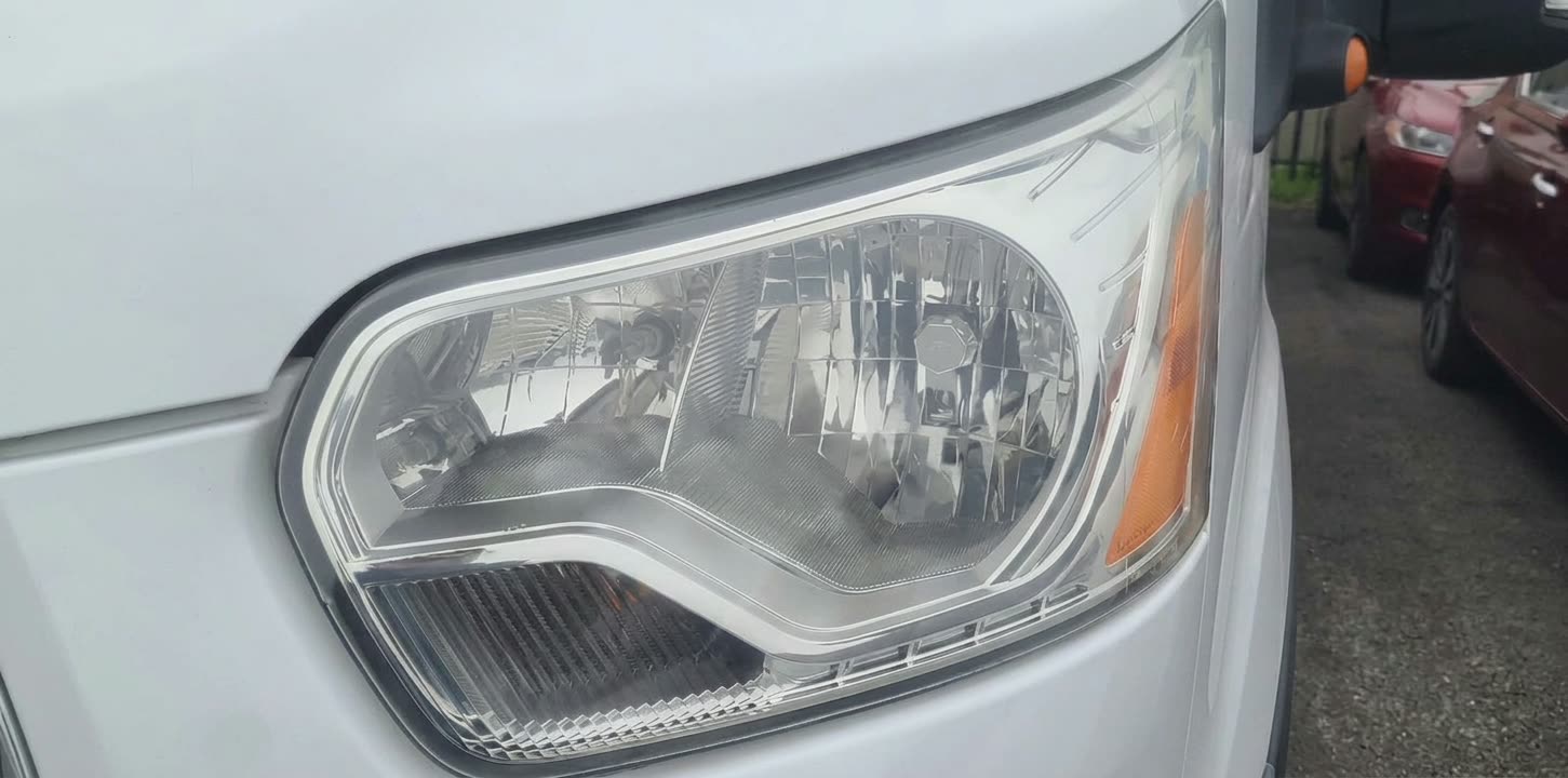 Ford Transit headlight restored to factory clarity in Houston